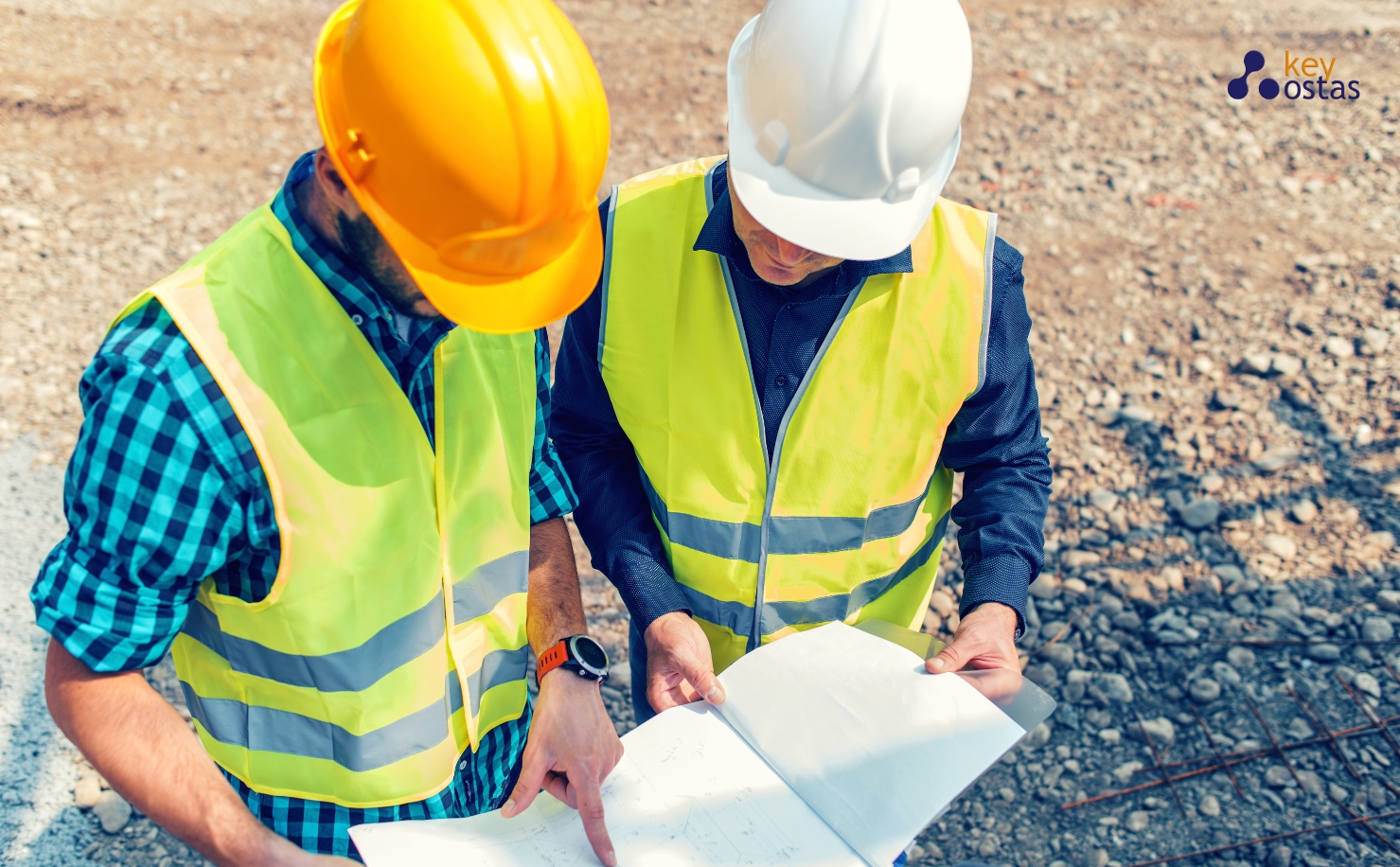 construction workers looking at planning document